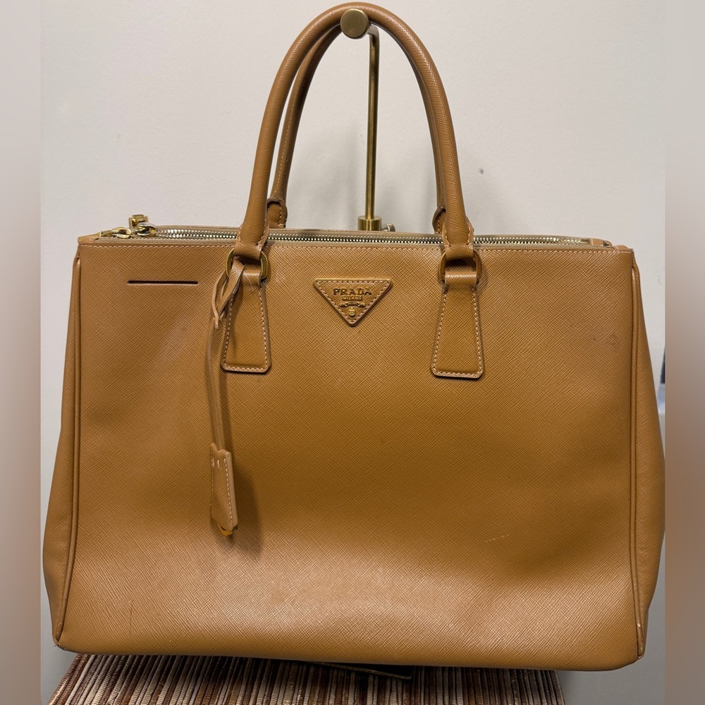 Prada Saffiano Lux Bag
Length -14 inches 
Width 6 inches 
Height 20 inches